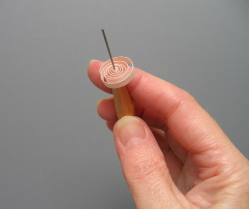 quilled loose coil on needle tool