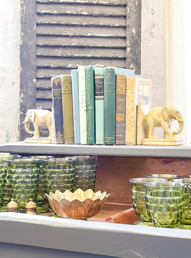 Green glasses and elephant bookends