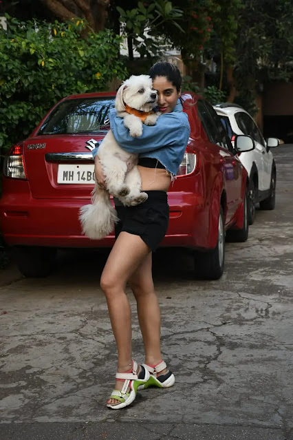 Neha Bhasin snapped in the city with her dog