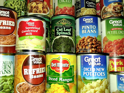 Canned foods in elderly woman's pantry