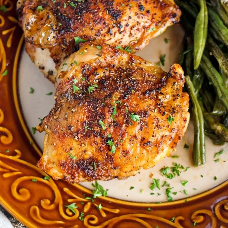 The Best Air Fryer Chicken Thighs | The Two Bite Club