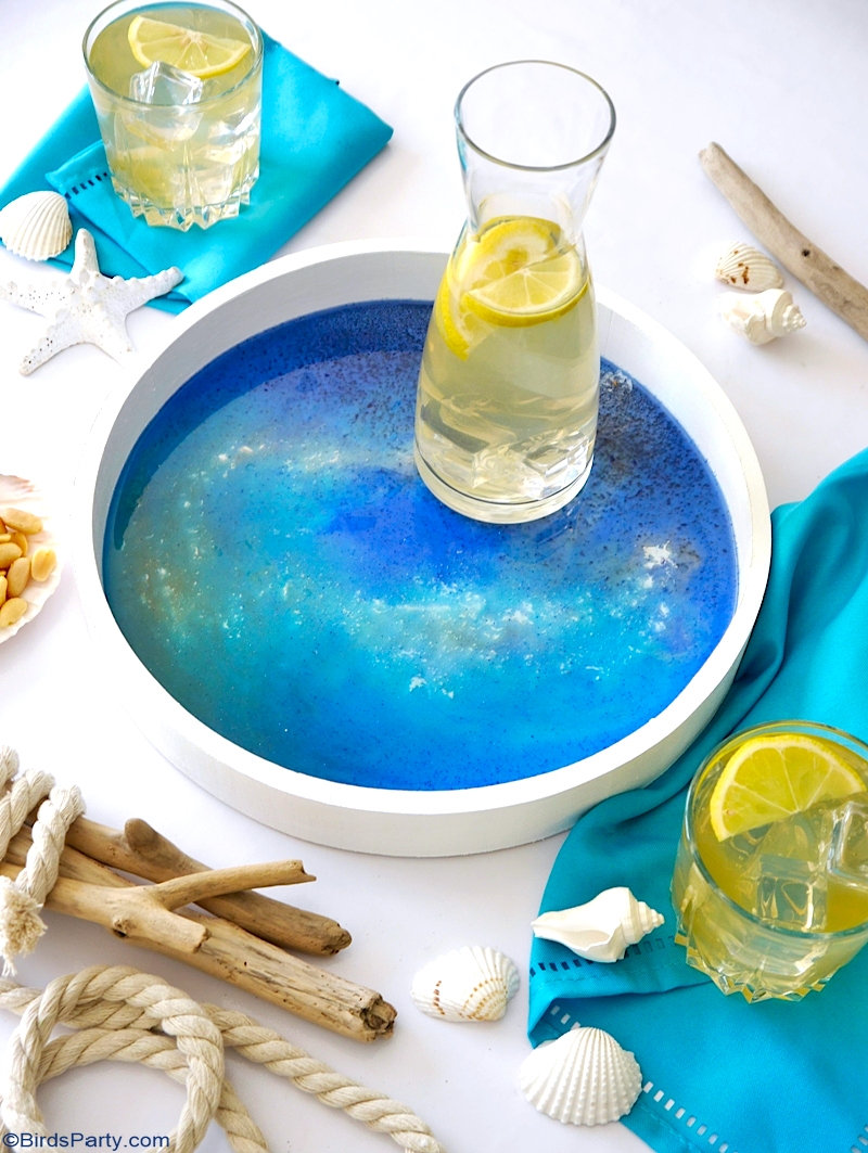 DIY Beach Inspired Epoxy Resin Tray - easy craft idea to serve drinks or to decorate your home and tables for summer! by BirdsParty.com @birdsparty #diy #crafts #resin #resinart #resincrafts #epoxyresin #resintray #summercarfts #beachcrafts #coastaldecor