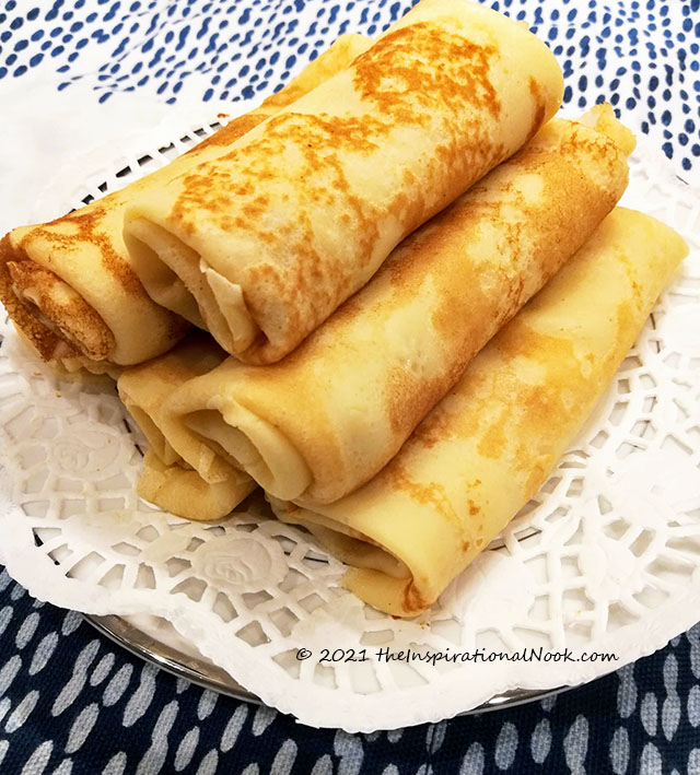 Pancakes, crepes, Anglo Indian pan rolls with sweet grated coconut filling, panrolls, shrove tuesday panrolls, shrove tuesday pancakes, mardi gras pancakes, mardi gras panrolls, Lenten pancakes, Lent. pancake tuesday, coconut pan rolls, jaggery