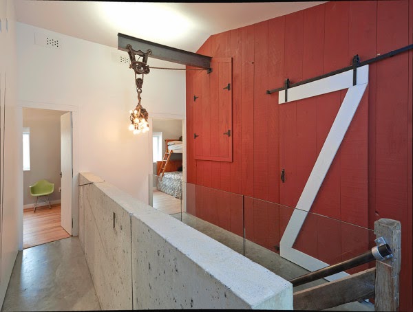 ilia estudio interiorismo: Concebida como un antiguo granero, pero