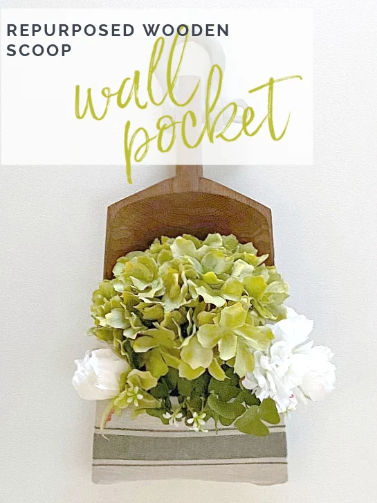 wall pocket full of flowers with overlay