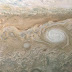 A swirling, oval white cloud in Jupiter