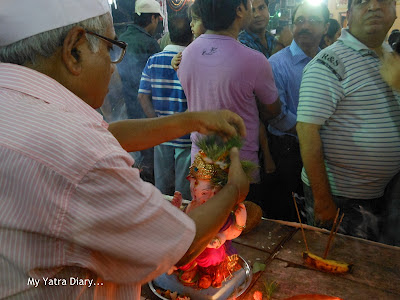 All religious paraphernalia are removed before ganesh immersion