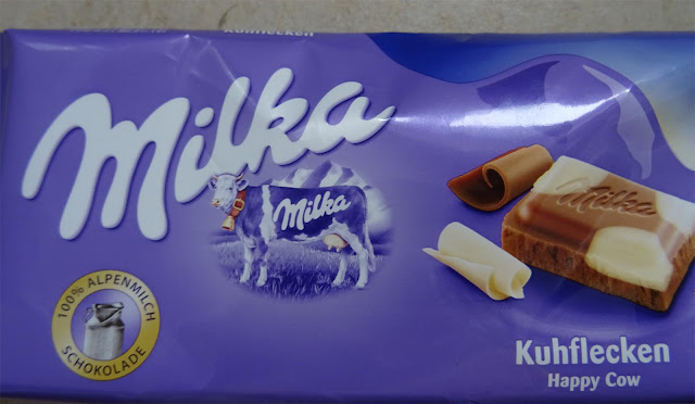 Tafel Milka Schokolade mit Kuhflecken