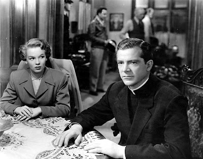 Joan Evans and Dana Andrews in a still from EDGE OF DOOM
