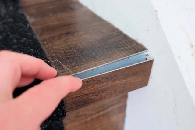 peeling vinyl tile on back stair