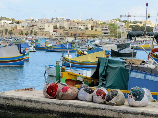 3 days in Malta itinerary: See the colorful boats and nets at Marsaxlokk