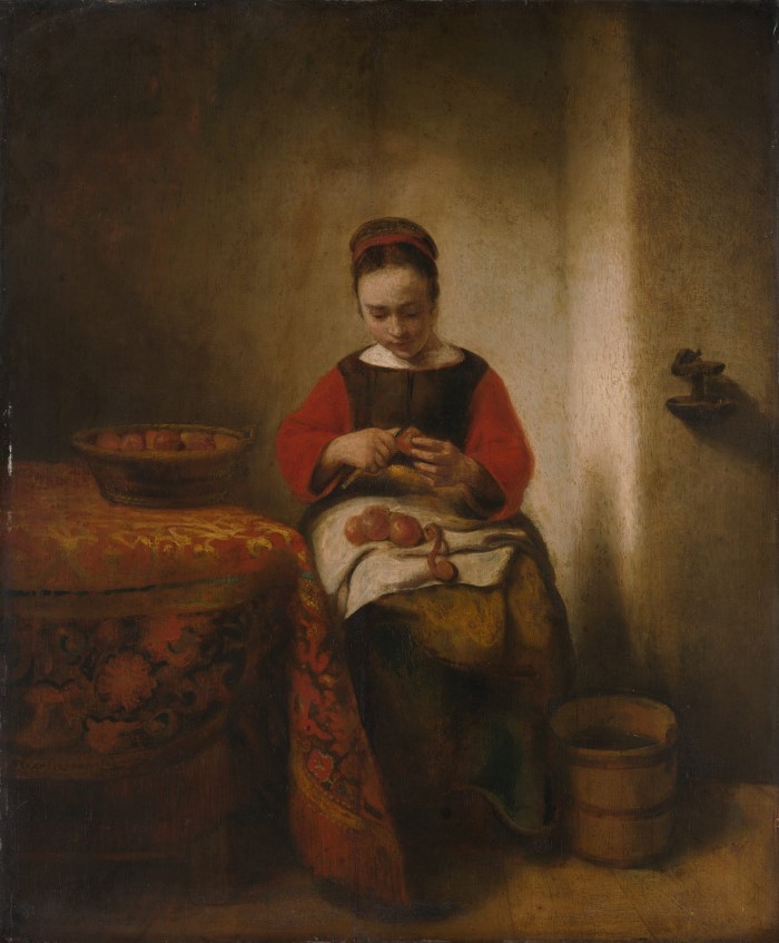 Young Woman Peeling Apples