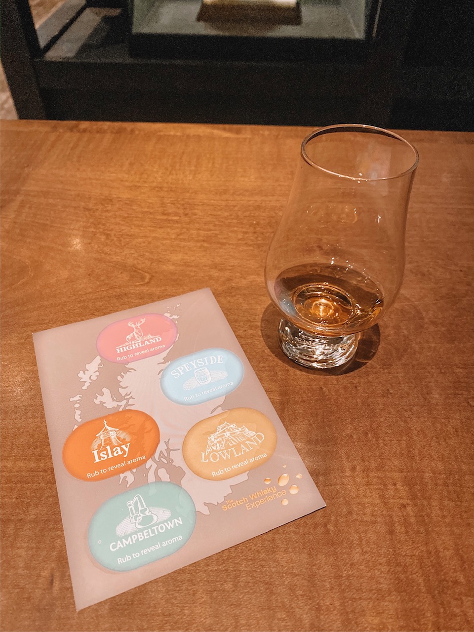 travel blogger Amanda Martin sips Scotch Whisky in Edinburgh 