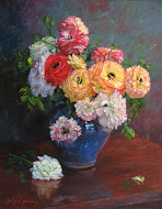 Colorful Ranunculus in Blue Vase