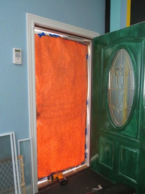 taping kraft paper in doorway