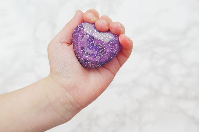 purple heart in hand