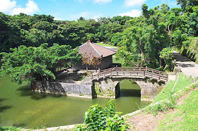Wide angle view of pond and building