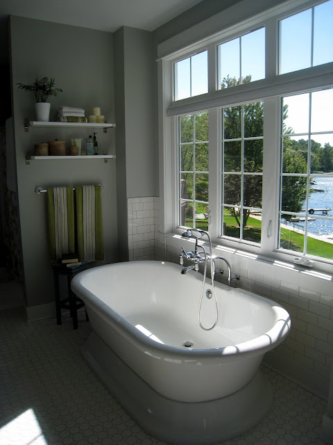 A large tub next to a window