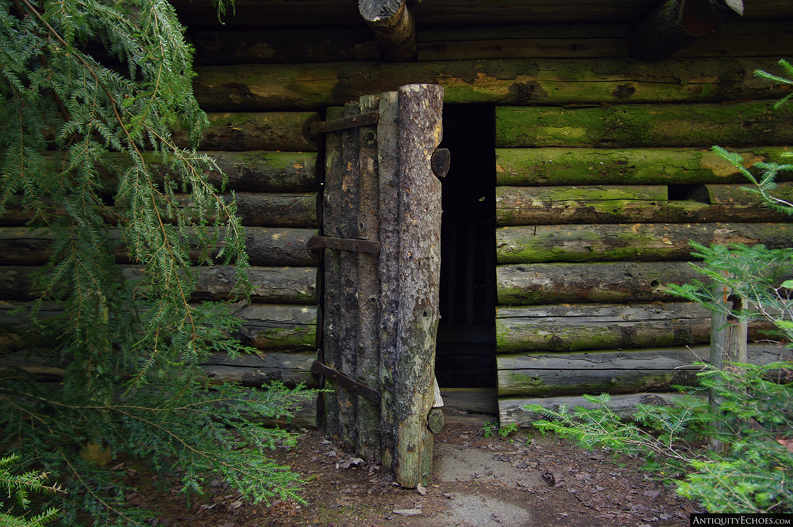 Frontier Town - Open Door into a Log Cabin