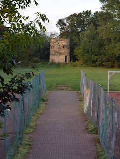 Tennis courts and the windmill in the background