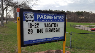 Parmenter School sign reminding of April vacation. Will this schedule be changed for the 2017-2018 calendar year? Find out at the April 26 School Committee meeting when the calendar committee reports.