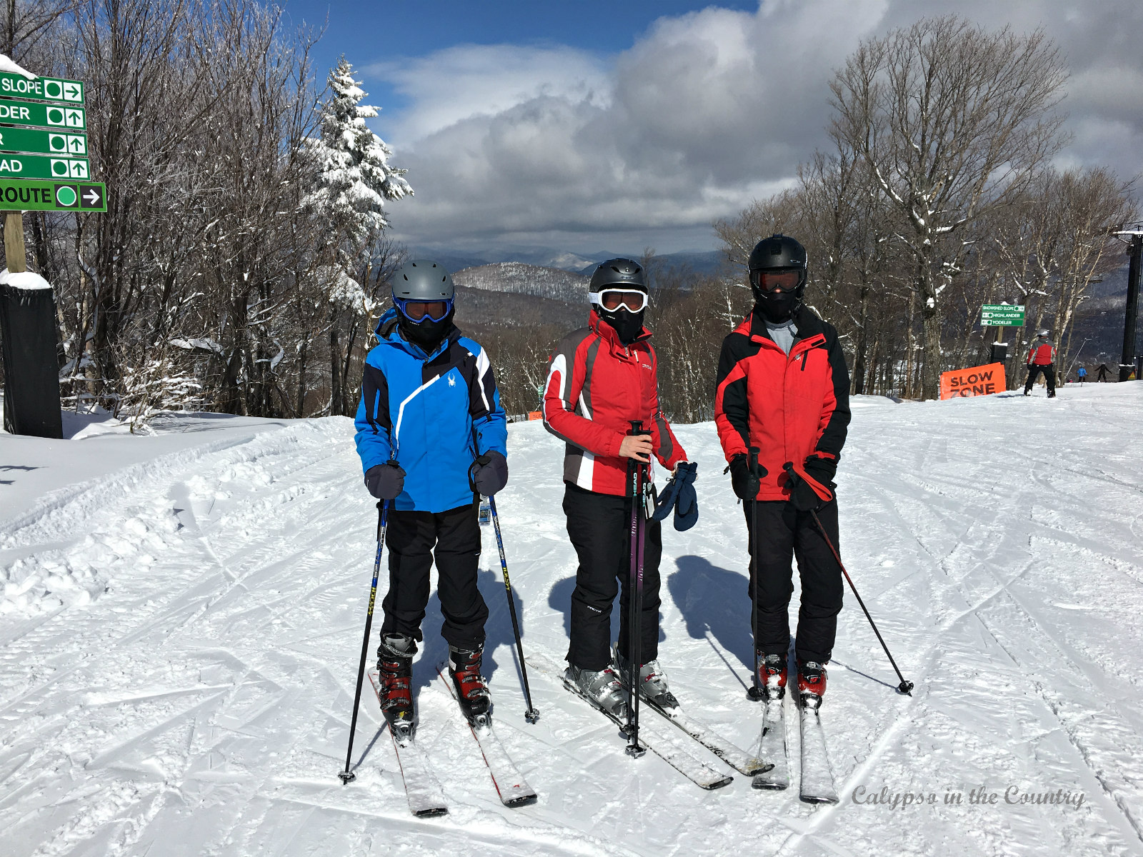 3 skiers on snowy trail