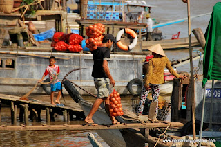 La vie quotidienne en marché flottant Cai Be - Photo An Bui La vie quotidienne en marché flottant Cai Be - Photo An Bui