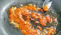 Sauteing ginger garlic and Chilly Paste for butter chicken Murgh makhani recipe