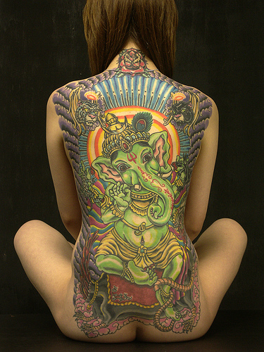 Above This full back tattoo of the Indian God Ganesh is colorful and 