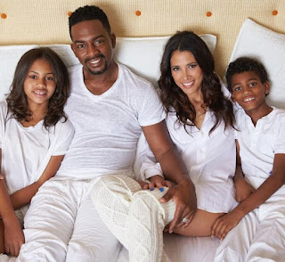 Kristen Baker Bellamy with her husband Bill Bellamy and their children