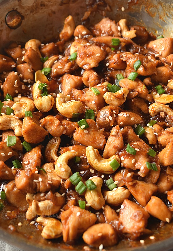 easy cashew chicken with spring onion and sesame seeds