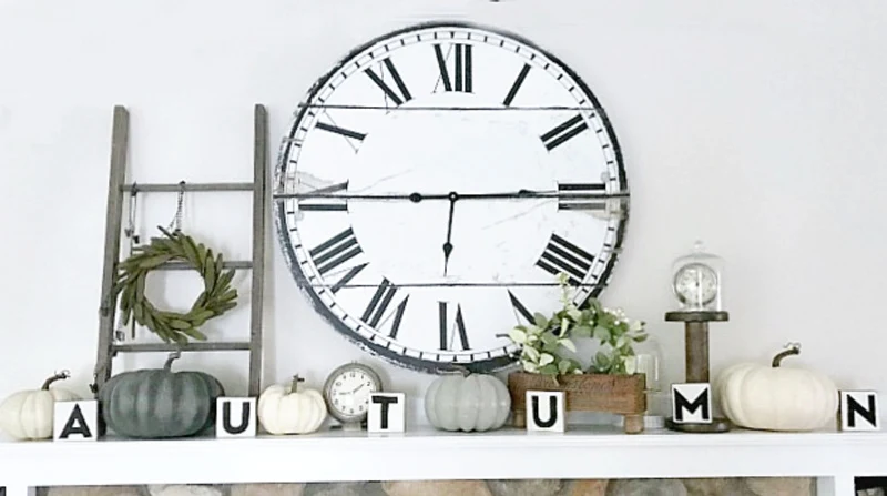 Mantel for fall with ladder, blocks and pumpkins