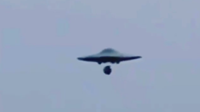 this is a UFO or Flying Saucer Releasing a UFO drone.