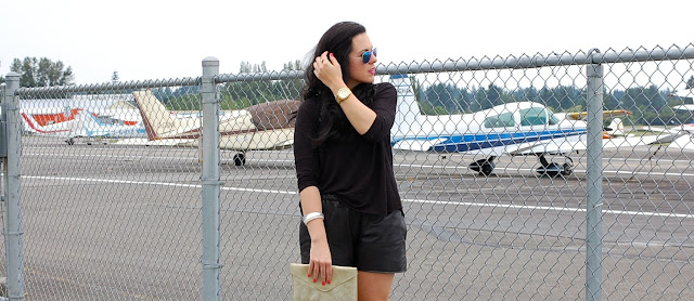 Valentino Rockstud flats, Topshop leather shorts and shirt and flash frame aviators.