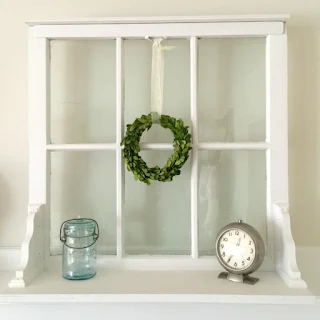 Window shelf DIY old windows and repurposed boards. 