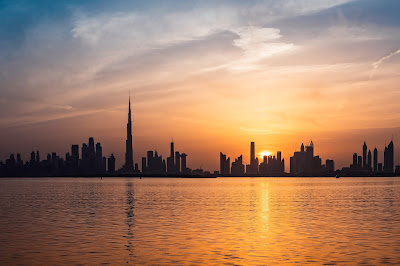 Sunset photography of a city line with reflection