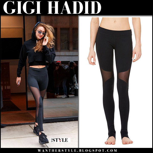 Gigi Hadid in black mesh detail leggings and black sweatshirt on April