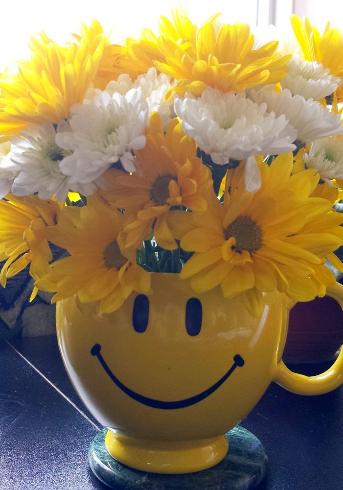 Week 18: In your (their) hands ~ home made cheerful flower arrangement, smiley mug :: All Pretty Things