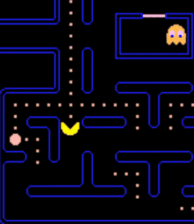 Animation of Pac-Man in the 1980 arcade version eating three ghosts after waiting for them to get close.