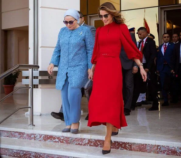 Queen Rania wore ANDREW GN belted crepe midi dress and Dior pumps. President Abdel Fattah El Sisi and Entissar Amer