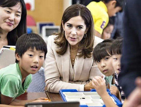 Crown Princess Mary wore Massimo Dutti Pant Suit. visits Funabashi primary school and Design Walk companies