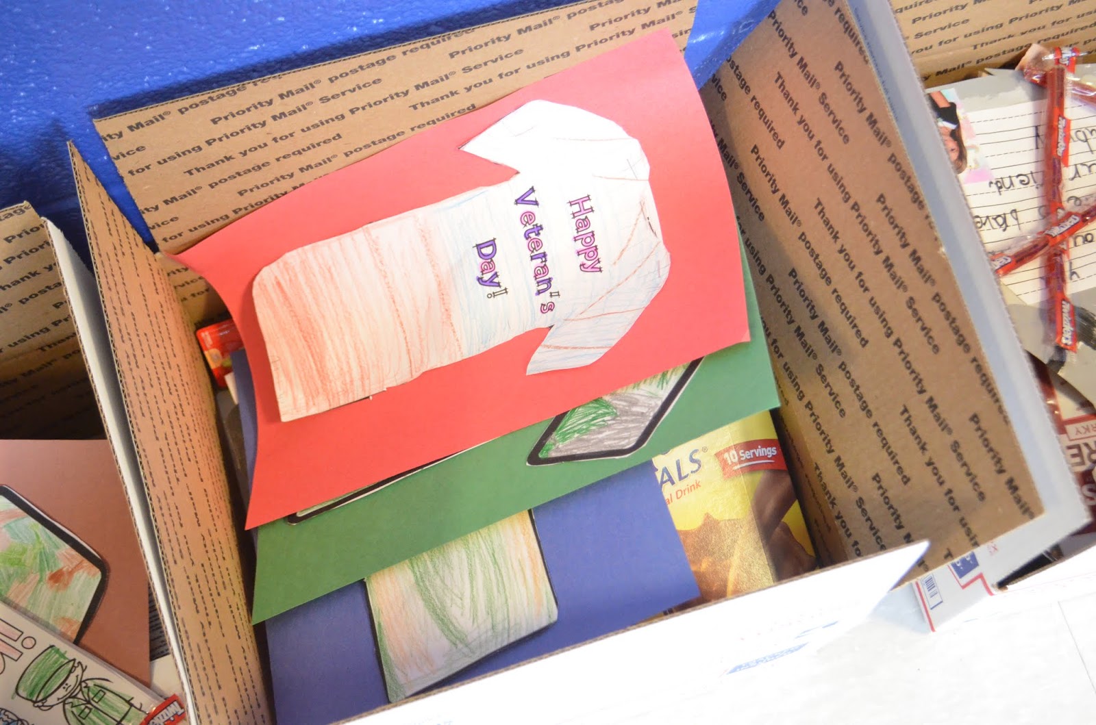 Elementary Students Learn About the Military; Packs Care Packages for