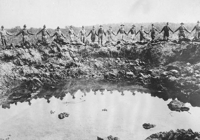 Original caption: Crater caused by an American bomb. Taken at Langley Field, showing the wide crater made by a certain type of bomb released from an aeroplane.