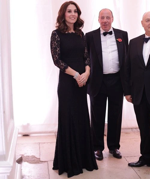 Kate Middleton wore DVF-Diane von Furstenberg Zarita gown. Queen's diamond pendant earrings, Prada clutch