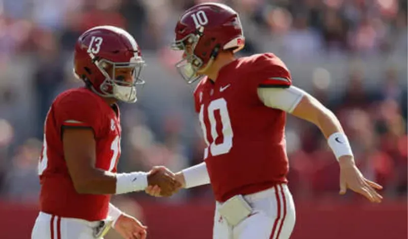 Mac Jones with his team mate Tua Tagavailoa