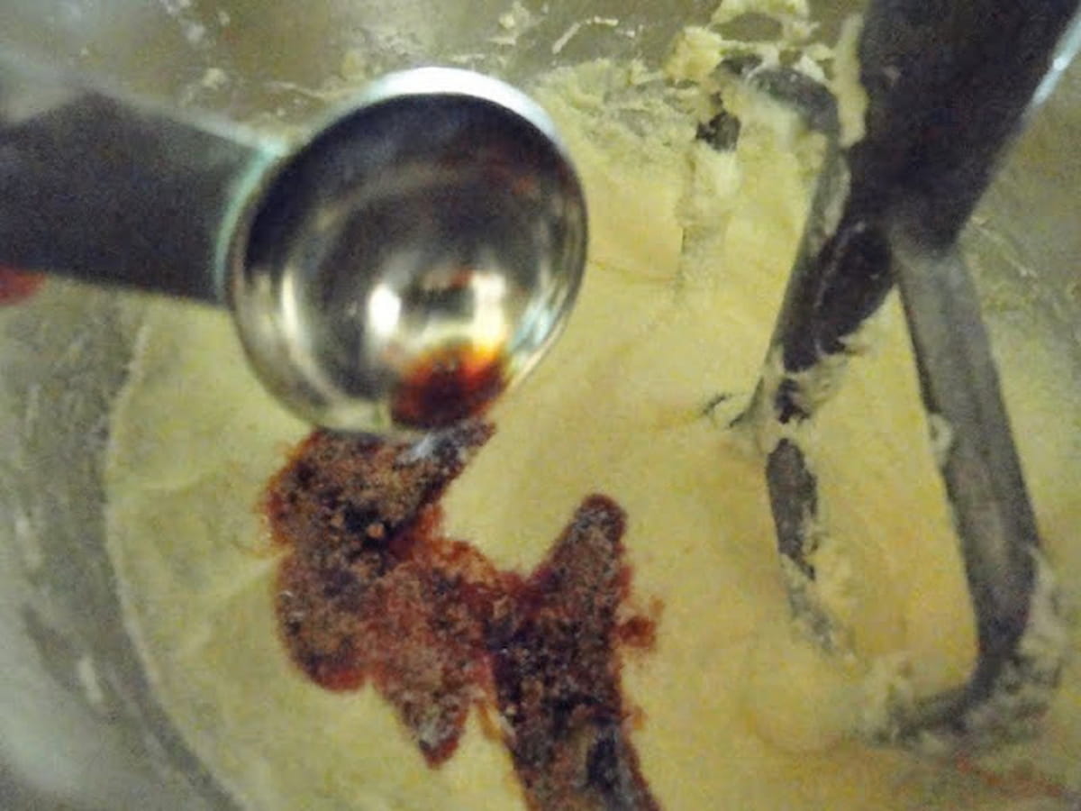 Vanilla being stirred into Coffee Cake batter.