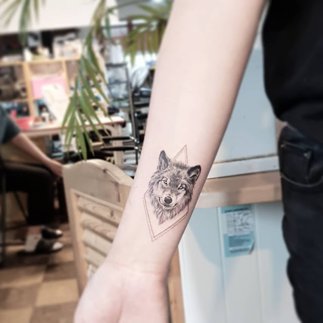 wolf tattoo - small tattoo ideas for women