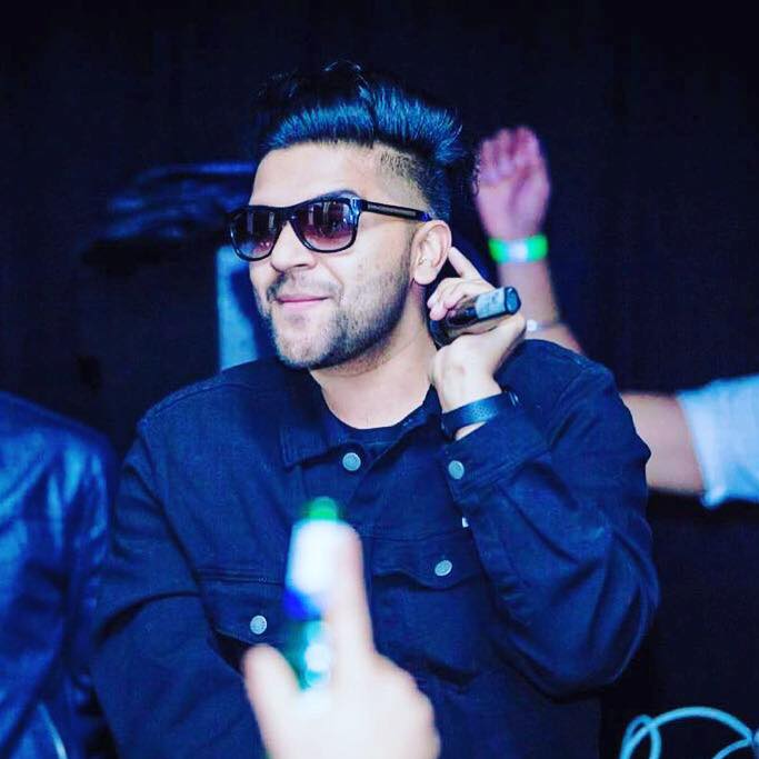 Download Stylish Guru Randhawa in Black Suit Wallpaper  Wallpaperscom