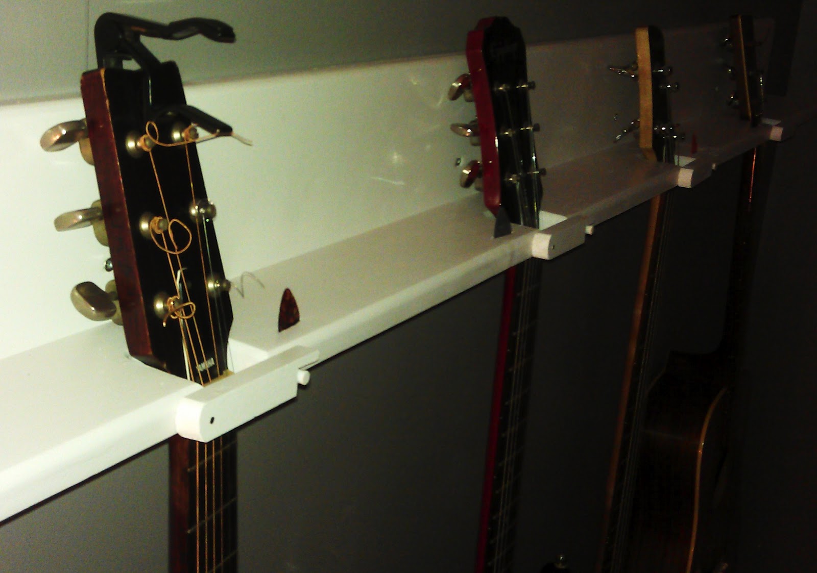 DIY 4Guitar Wall Hanger. Cost 15ish. FEATURED AS AN EDITOR'S CHOICE