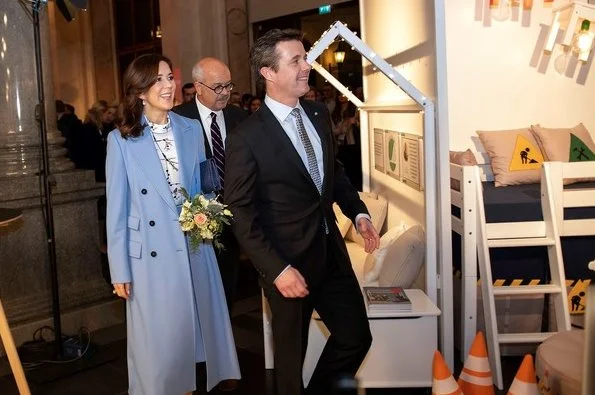 Crown Princess Mary wore Stine Goya blouse, Ralph Lauren wool coat, Gianvito Rossi Pumps and carried Quidam clutch